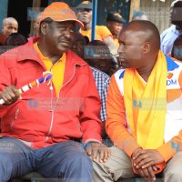 Cord Raila Odinga (Center) shares a word with ODM candidate in the Nyacheki ward by election