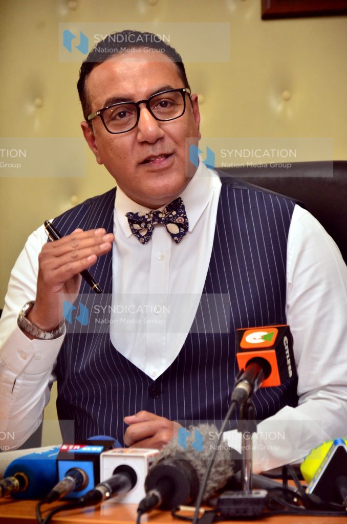 Tourism Cabinet Secretary Najib Balala gestures while addressing media