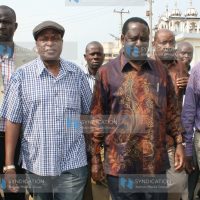 Former Prime Minister Raila Odinga (centre) leaves a Sikh temple