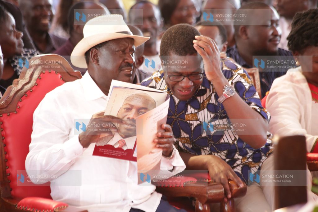 ODM leader Raila Odinga chats with Ugunja MP Opiyo Wandayi