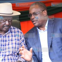 CORD leader Raila Odinga (left) chats with Nairobi Governor Evans Kidero