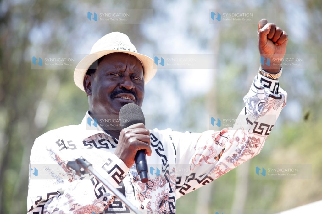 ODM leader Raila Odinga addresses mourners at a funeral