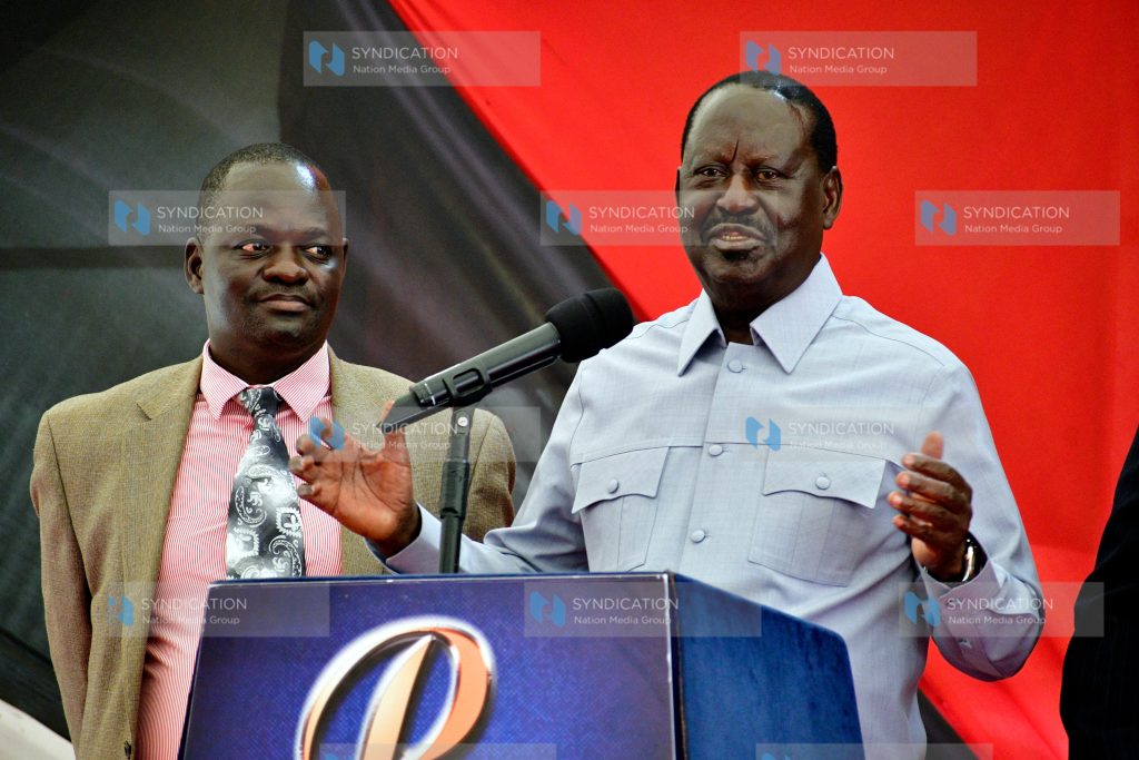 Raila Odinga (right) briefs media on the Government-to-Government oil deal