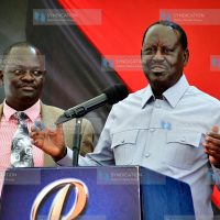 Raila Odinga (right) briefs media on the Government-to-Government oil deal