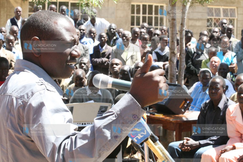 Suspended Higher Education Minister William Ruto addresses faithful during a fundraiser