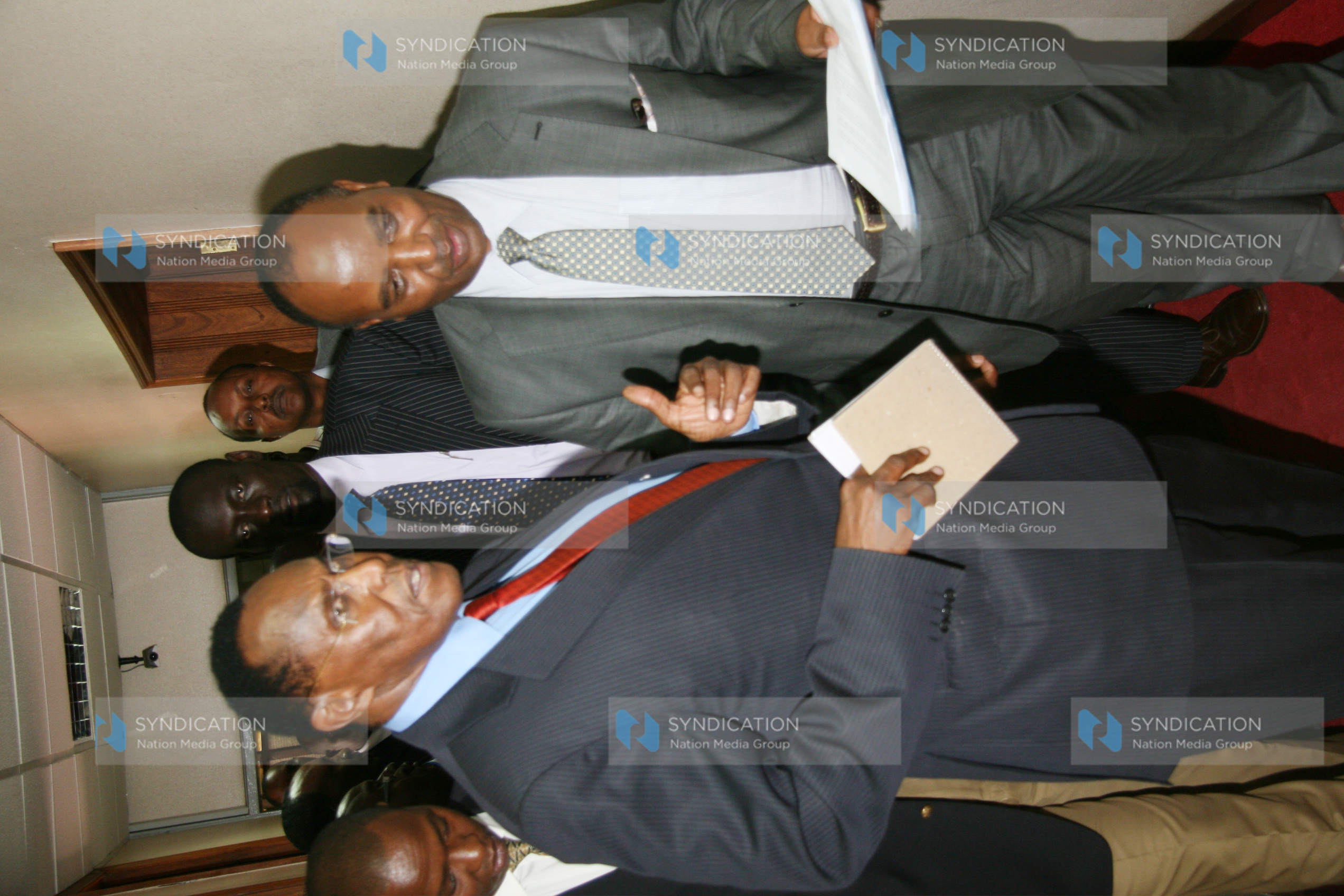 Minister for Internal Security Prof George Saitoti with the Permanent Secretary Francis Kimemia
