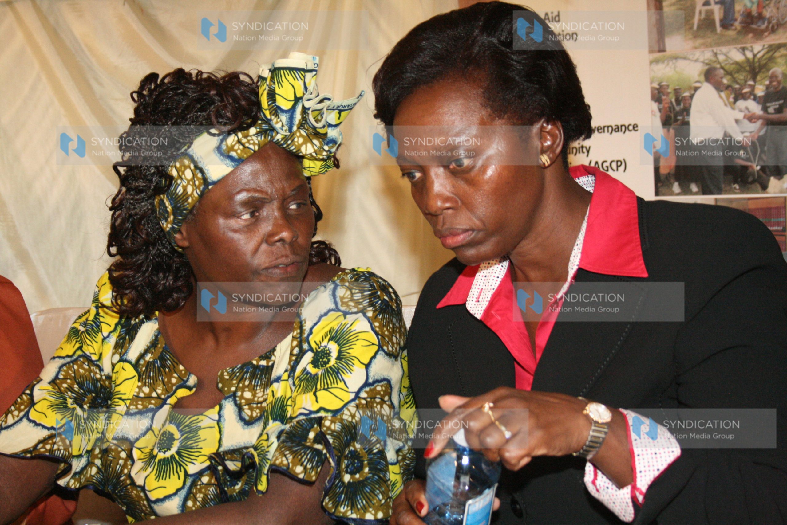 Nobel Peace Prize laureate Professor Wangari Maathai, confers with former Justice Assistant Martha Karua Cheptumo