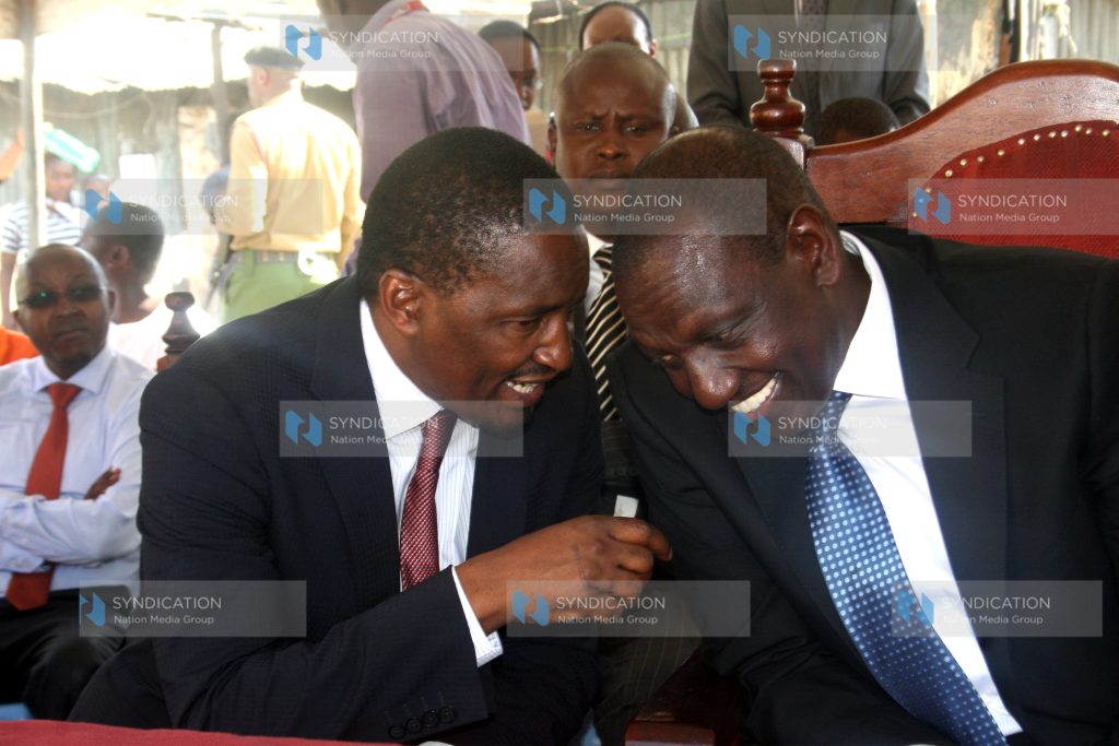 Deputy President William Ruto Cabinet Secretary Devolution and Planning Mwangi Kiunjuri flanked by Kieni MP Kanini Kega