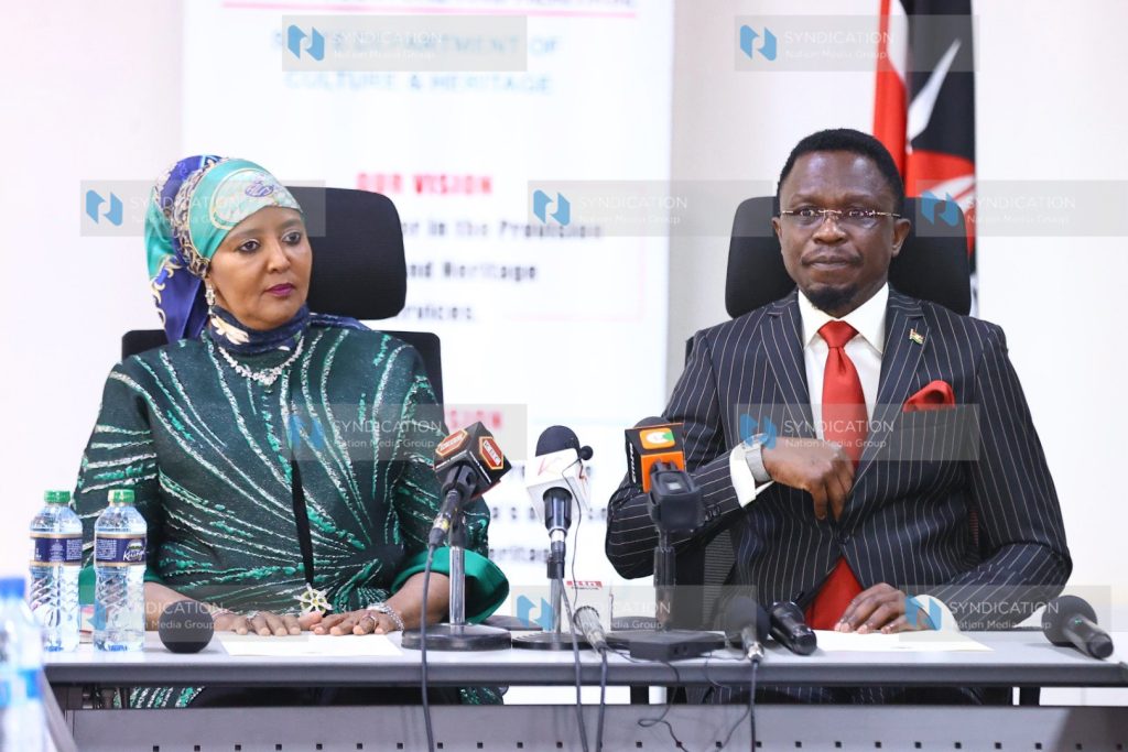 Outgoing CS Amina Mohamed with Incoming Sports CS Ababu Namwamba