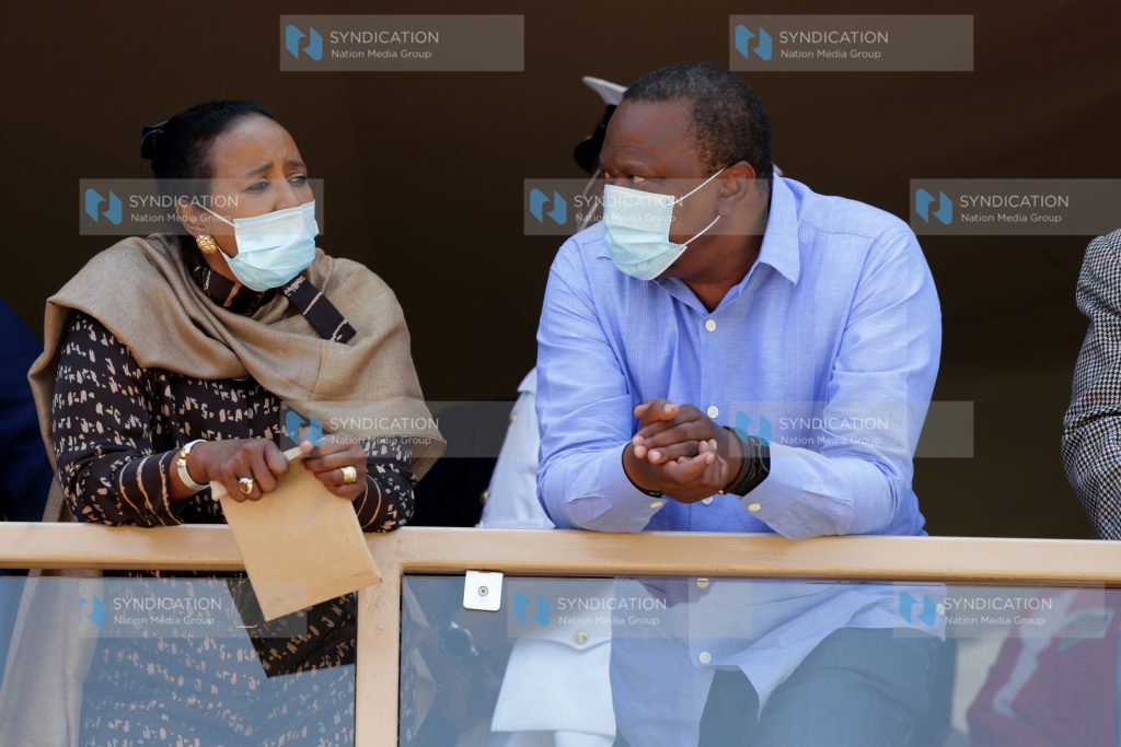 President Uhuru Kenyatta chats with Sports Cabinet Secretary Amina Mohamed
