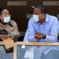 President Uhuru Kenyatta chats with Sports Cabinet Secretary Amina Mohamed