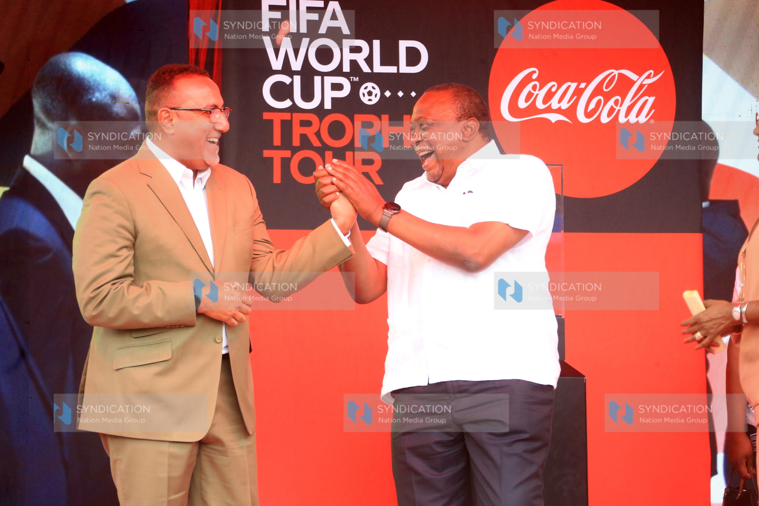 President Uhuru Kenyatta haves a chat with Cabinet Secretary Tourism Najib Balala