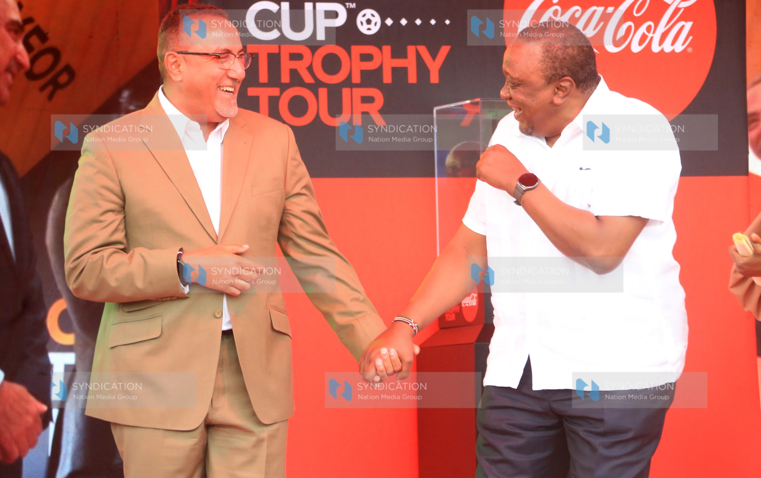 President Uhuru Kenyatta has a chat with Cabinet Secretary Tourism Najib Balala