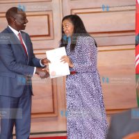 President William Ruto handing over title deed to Nakuru Governor Susan Kihika