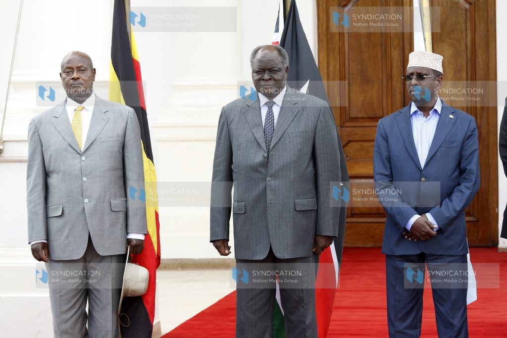 President Mwai Kibaki with Somalia's President Sheikh Sharrif and Uganda's counterpart Yoweri Museveni