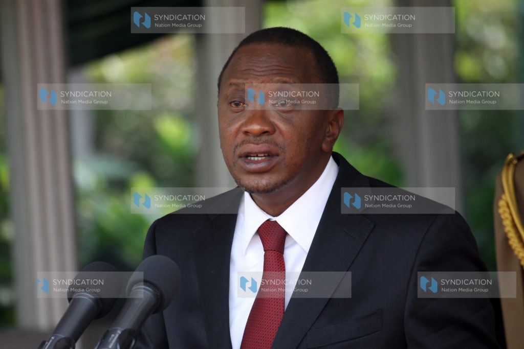 President Uhuru Kenyatta during the swearing-of Principal Secretaries