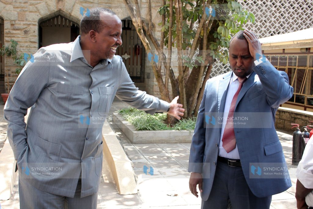 Majority Leader Aden Duale shares a word with Suna East MP Junet Mohamed