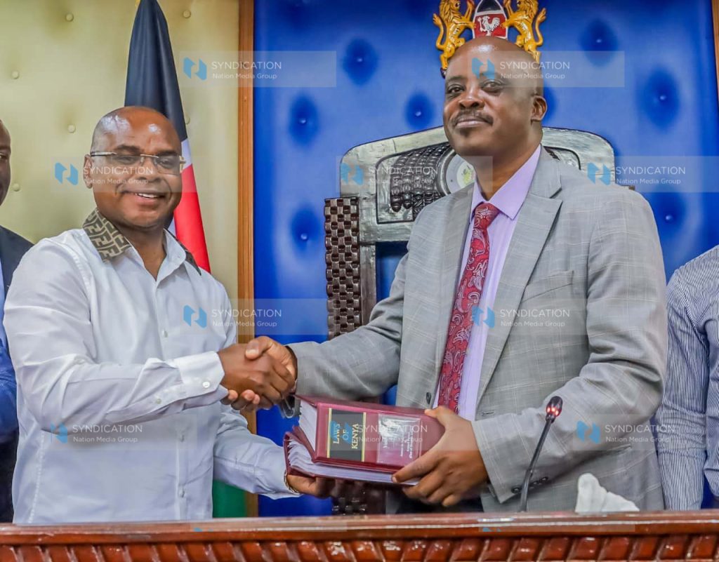 Senate Speaker Amason Jeffah Kingi and Busia County Assembly Clerk Fredrick Wafula Odilo