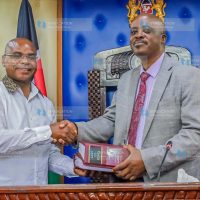 Senate Speaker Amason Jeffah Kingi and Busia County Assembly Clerk Fredrick Wafula Odilo