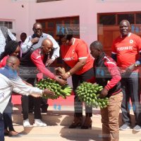 Homa Bay Governor Gladys Wanga receives a gift from players from Shabana Football Club