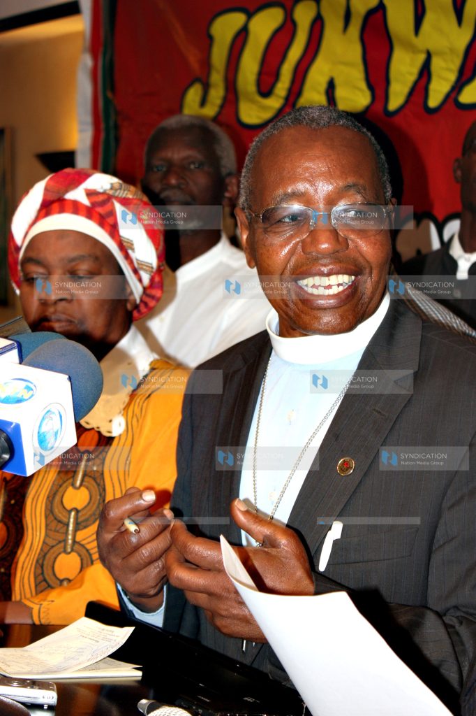 Human rights activist Dr Timothy Njoya flanked by National Civil Society Congress