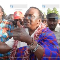 Deputy Prime Minister Uhuru Kenyatta joins traditional dancers in Lokichar, Turkana South District