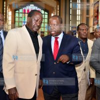 Interior Cabinet Secretary Fred Matiang’i walks with former Prime Minister Raila Odinga