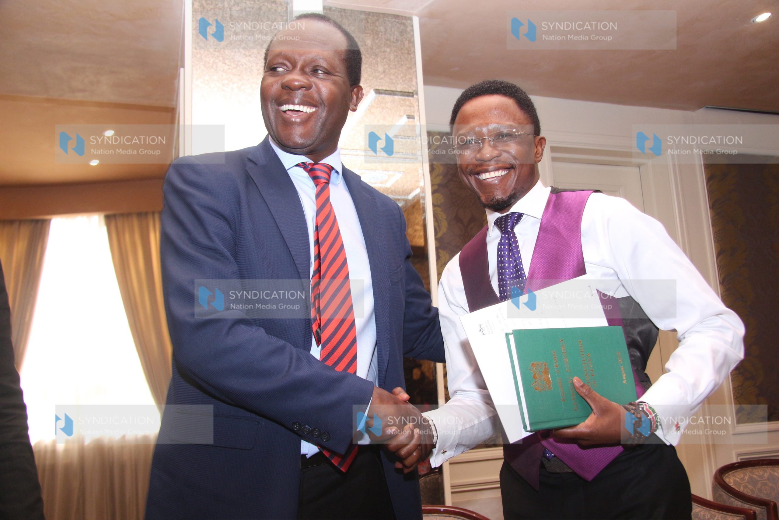 Jubilee Party Secretary-General Raphael Tuju with the chairman to council of professionals of Kenya Ababu Namwamba
