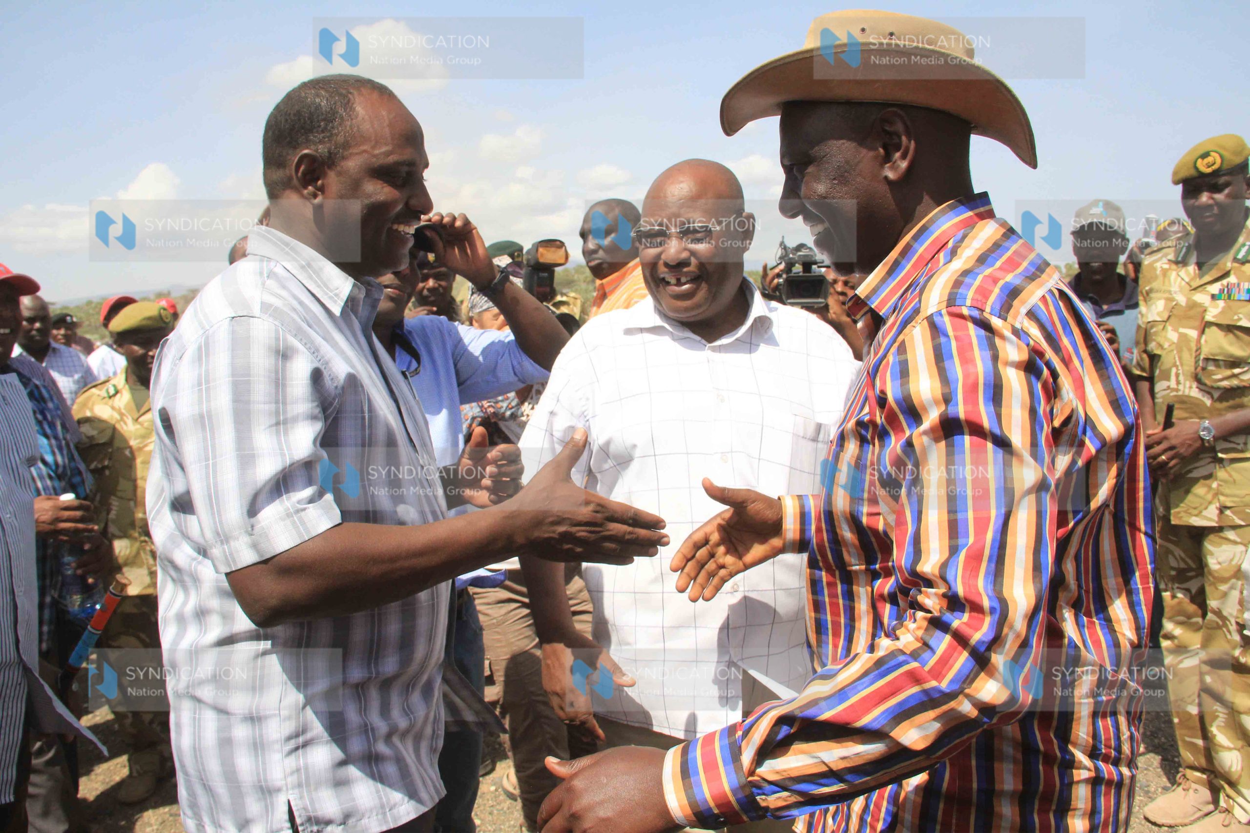 Deputy President William Ruto greets Marsabit governor Ukur Yatani