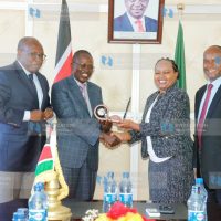 Kirinyaga Governor Anne Waiguru receiving an award for the best tax-compliant county
