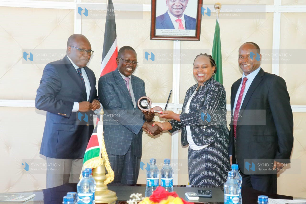 Kirinyaga Governor Anne Waiguru receiving an award for the best tax-compliant county