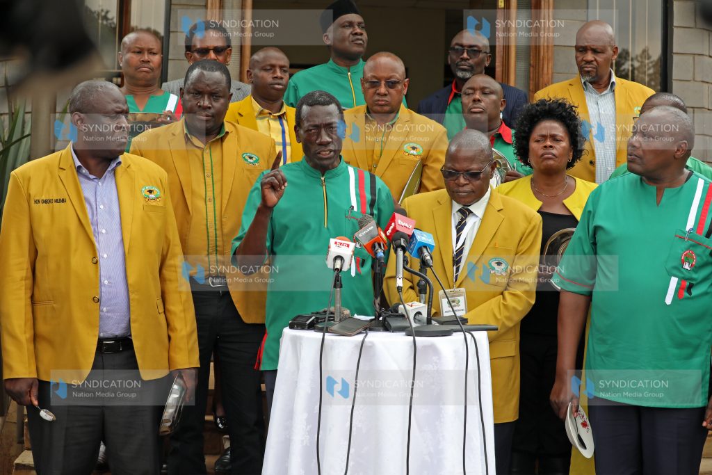 Teachers' union officials led by KNUT Secretary General Collins Oyuu and KUPPET Secretary General Akello Misori