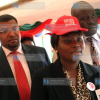 Tourism Assistant Minister Ms. Cecily Mbarire is led around the exhibition stands