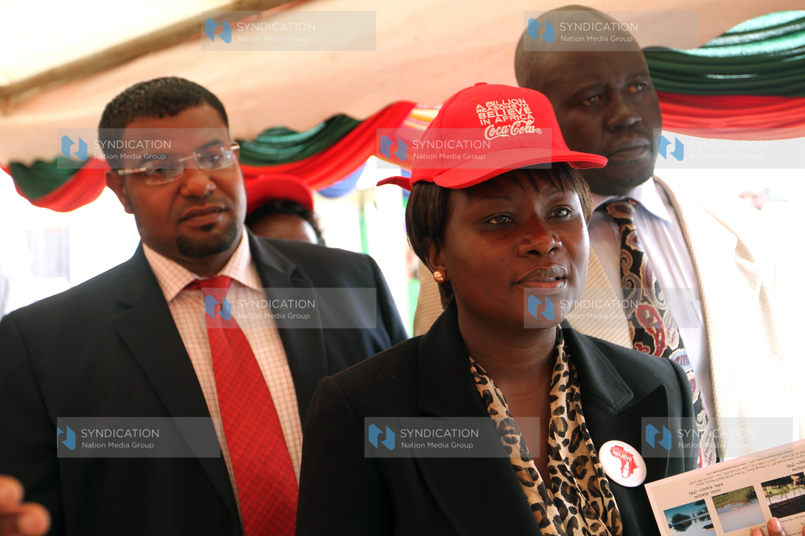 Tourism Assistant Minister Ms. Cecily Mbarire is led around the exhibition stands