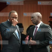 President Uhuru Kenyatta chats with Deputy President Willam Ruto