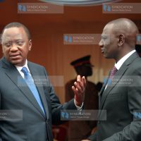 President Uhuru Kenyatta chats with Deputy President Willam Ruto