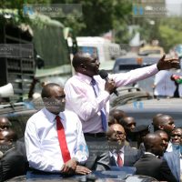 President Uhuru Kenyatta with his deputy William Ruto among other leaders speaking to Kenyans