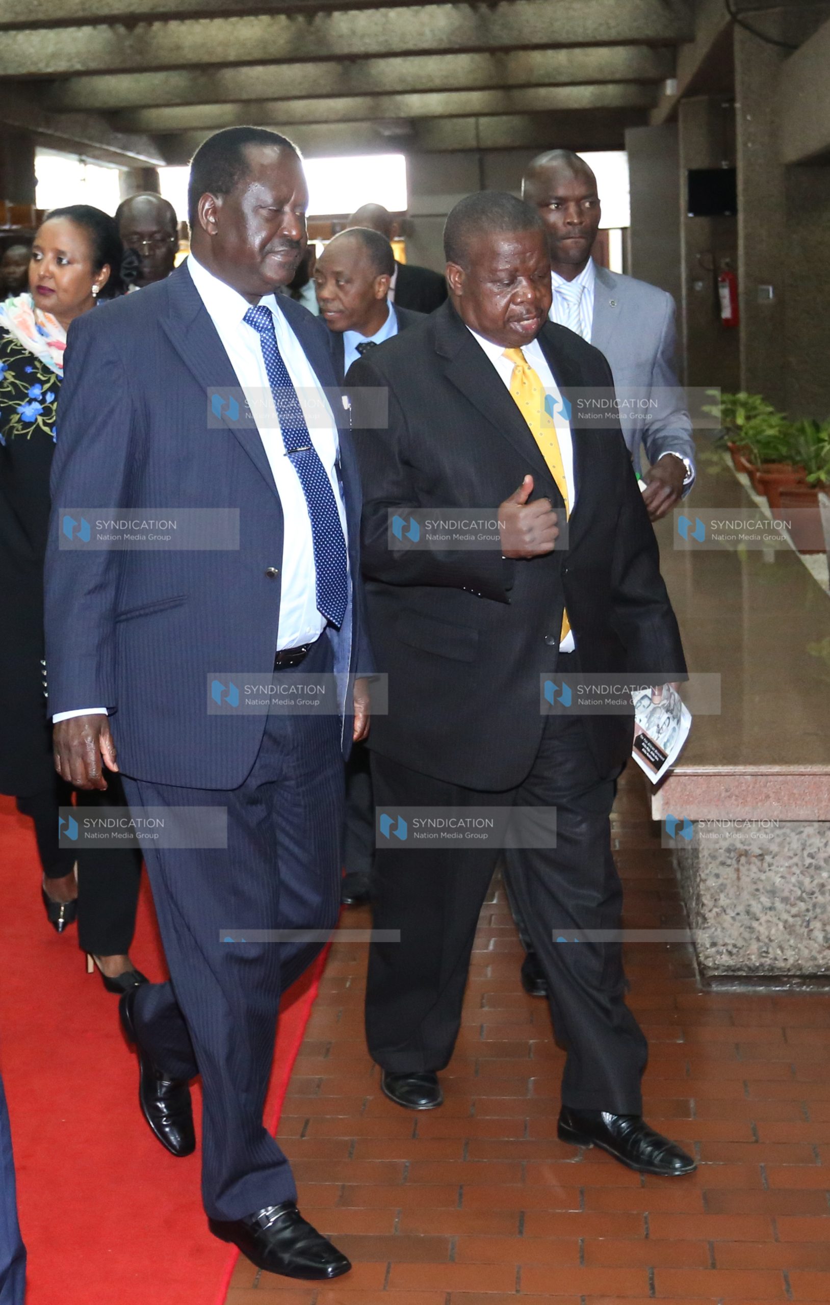 Opposition leader Raila Odinga and Ugandan Minister for Justice (Rtd) Maj Gen Kahinda Otafiire