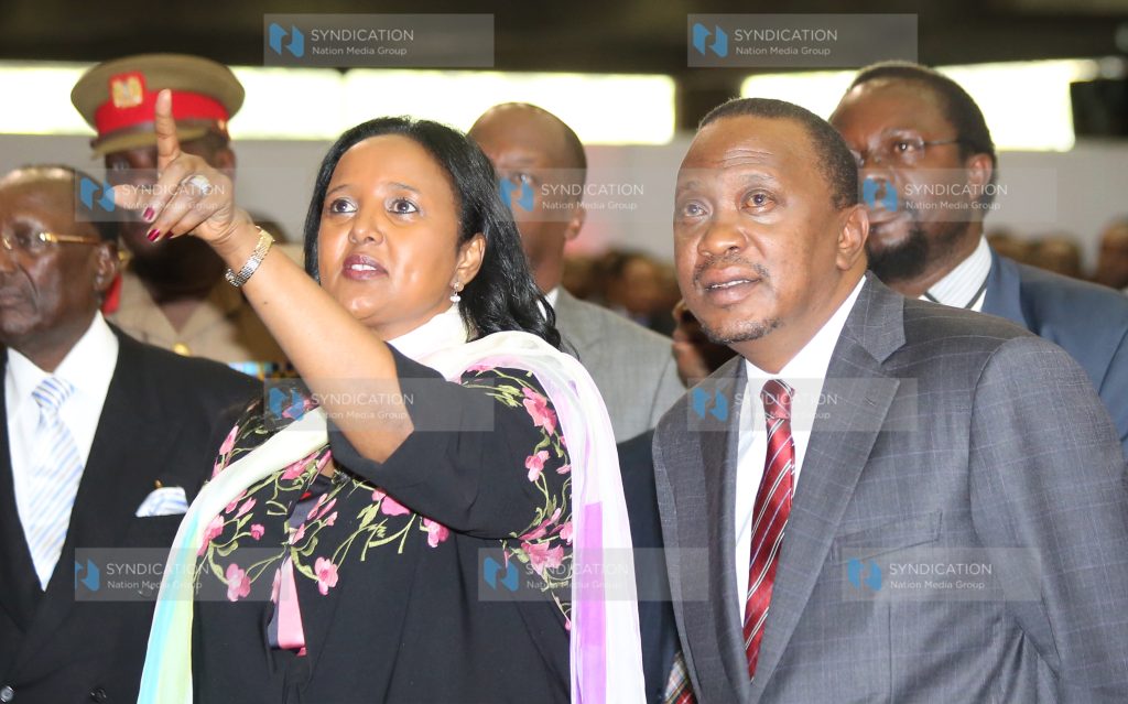 Foreign Affairs Cabinet Secretary Amina Mohamed talking President Uhuru Kenyatta