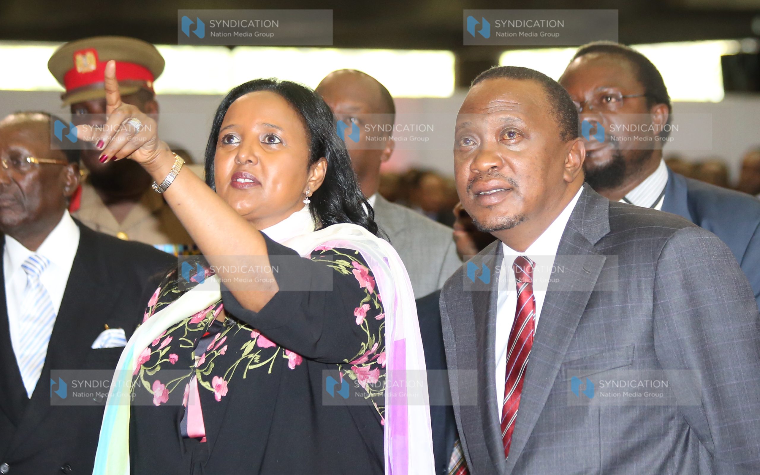 Foreign Affairs Cabinet Secretary Amina Mohamed talking President Uhuru Kenyatta