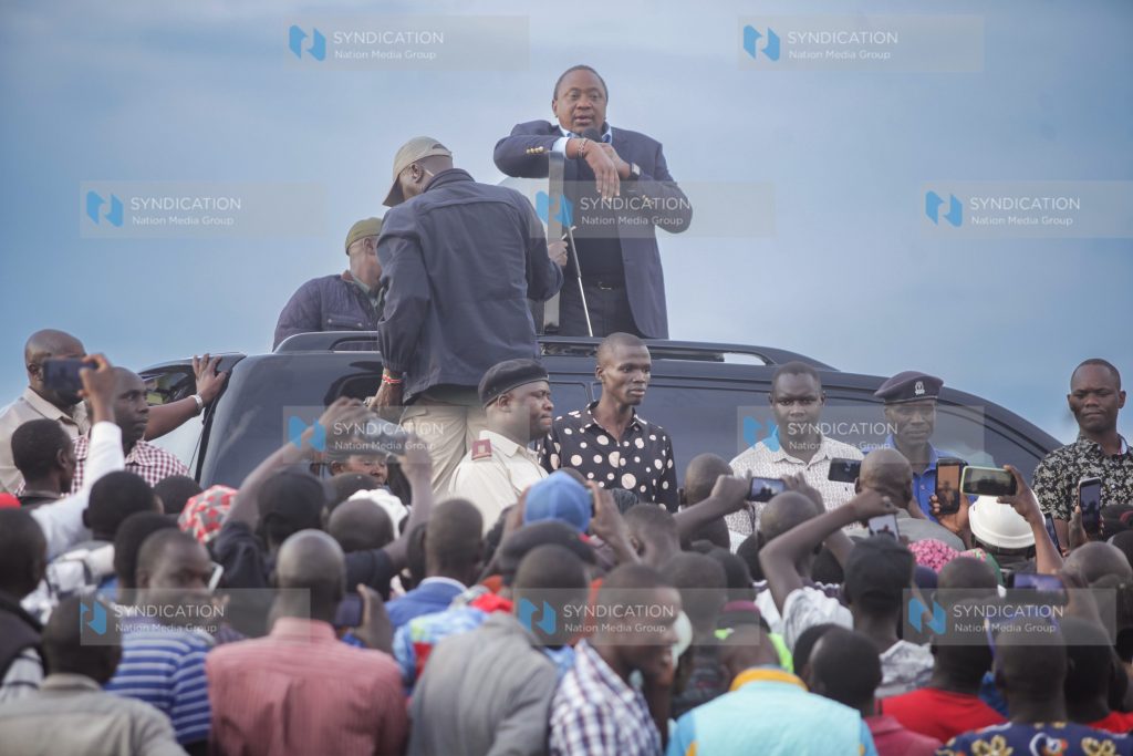 President Uhuru Kenyatta gives an address at Muhoroni where he went to commission Oroba bridge