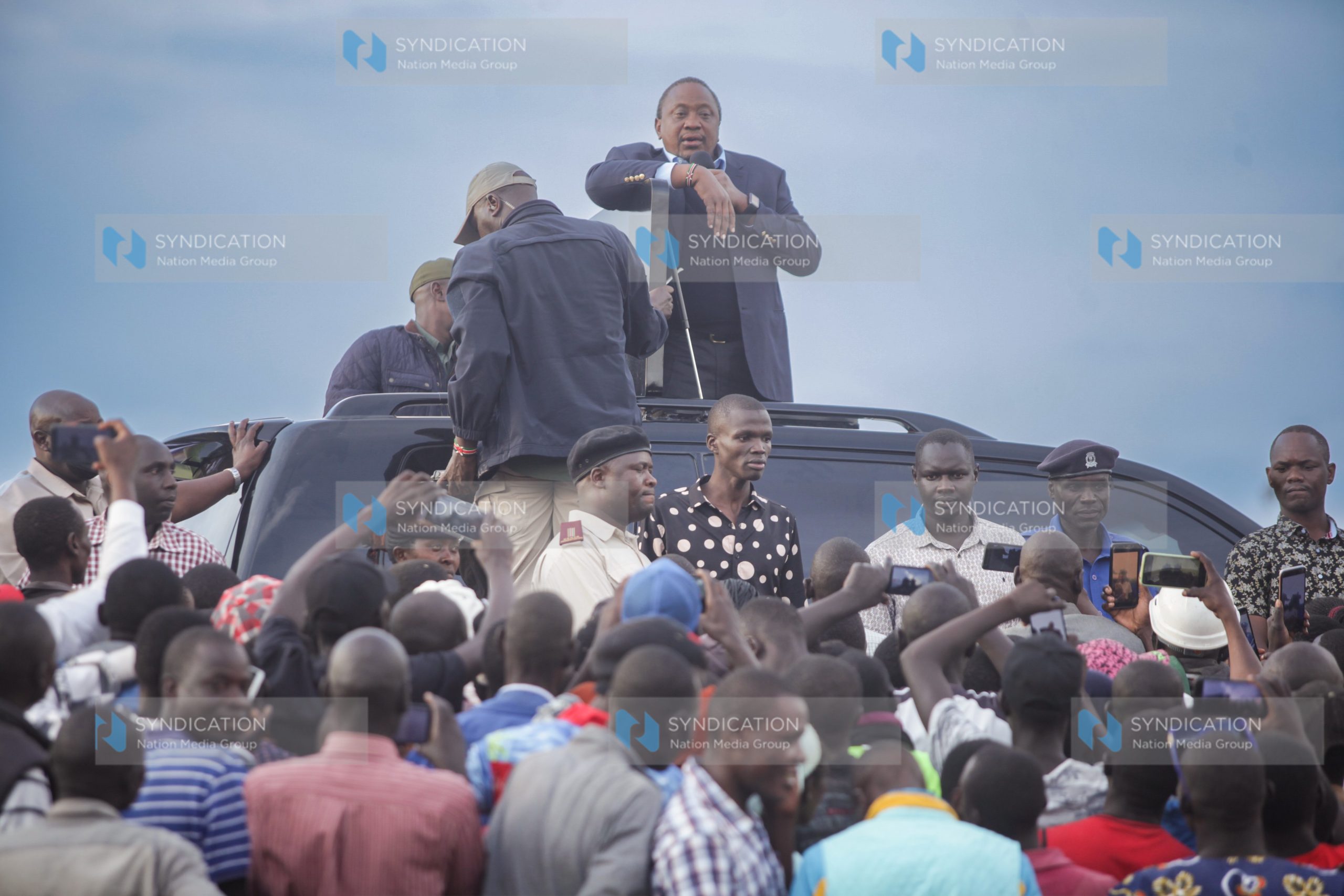 President Uhuru Kenyatta gives an address at Muhoroni where he went to commission Oroba bridge