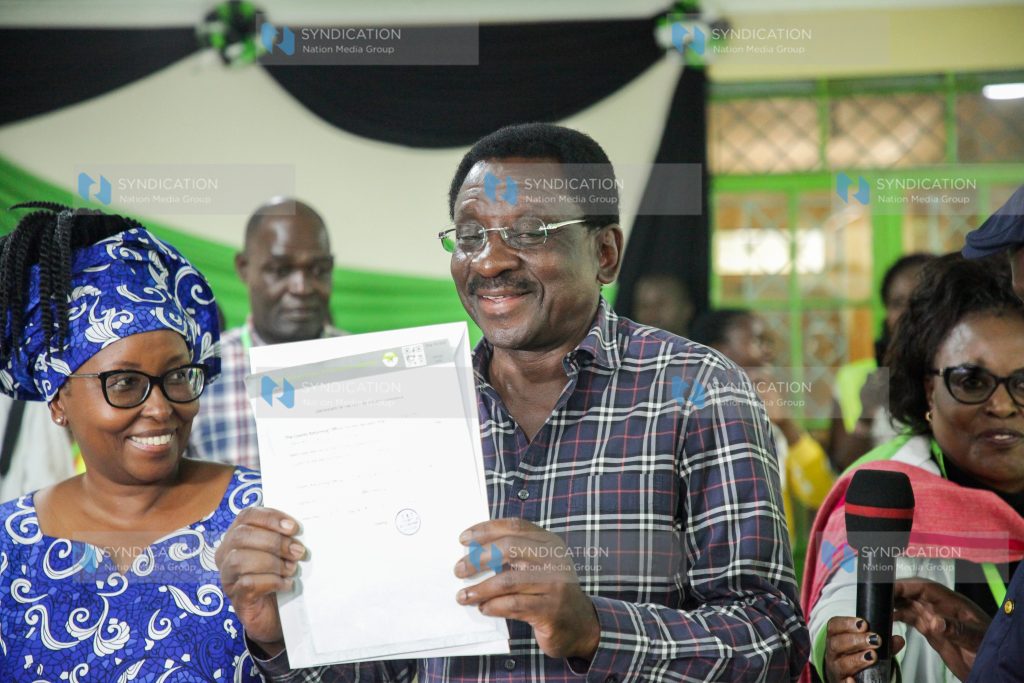 James Orengo displays the certificate he was awarded after winning the Siaya Gubernatorial seat