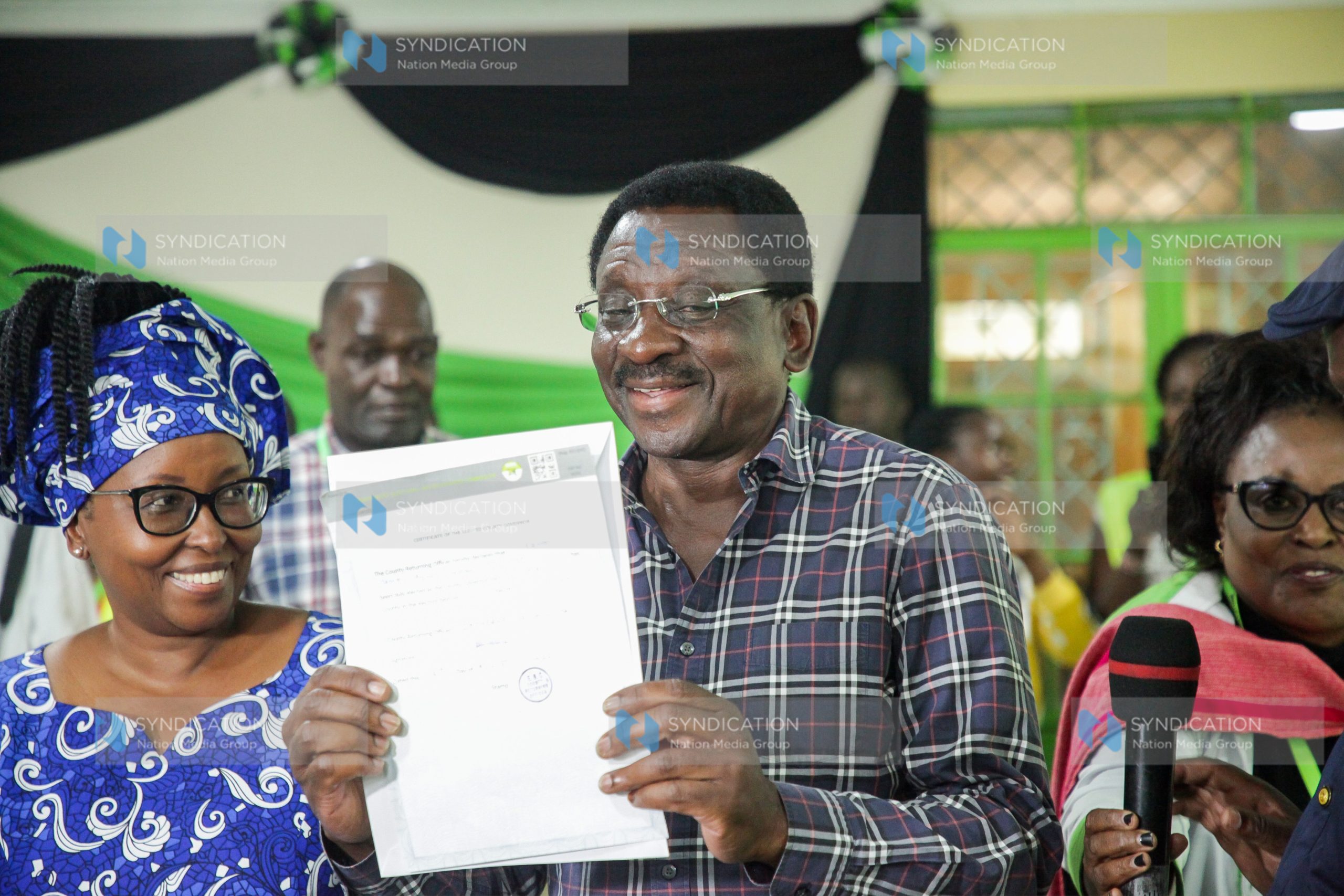James Orengo displays the certificate he was awarded after winning the Siaya Gubernatorial seat