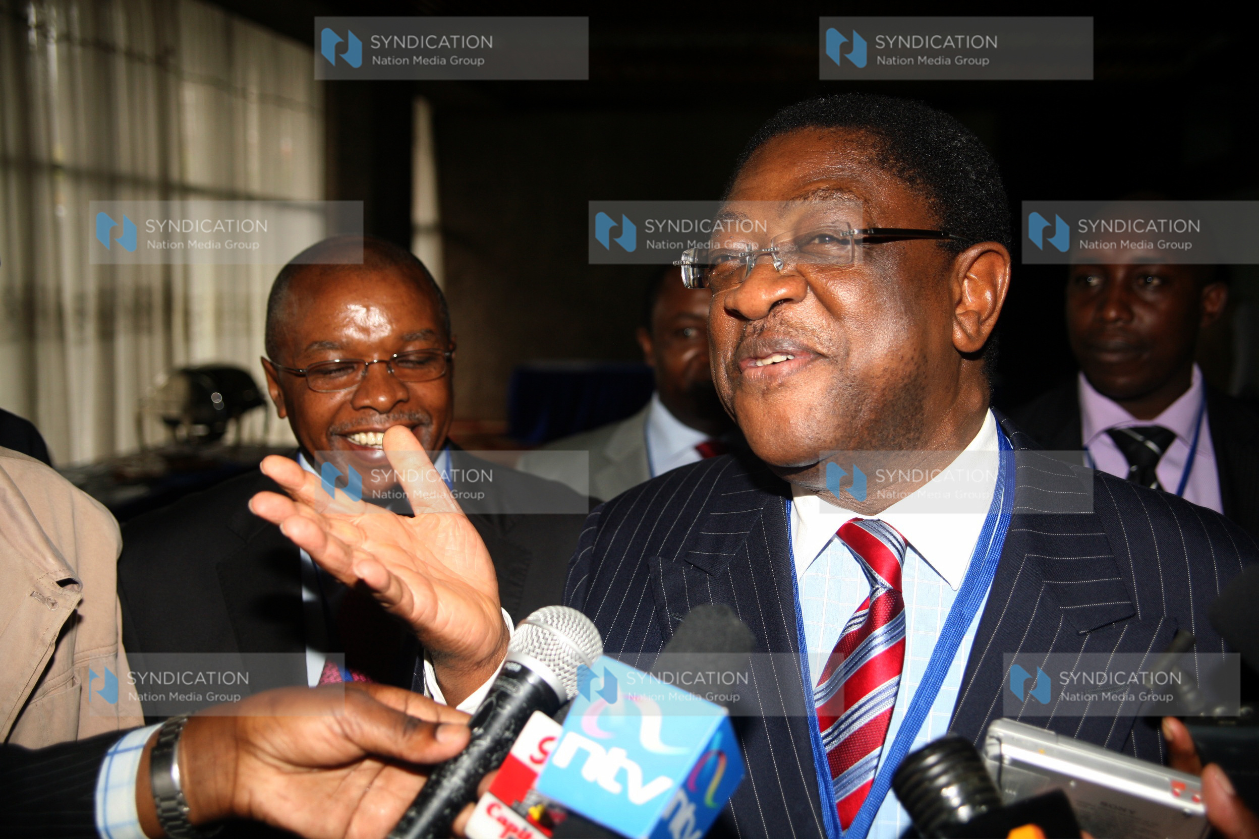 Attorney General Amos Wako addresses the media