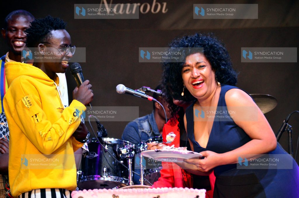 Comedian MCA Tricky shares a light moment Nairobi County Women Rep Esther Passaris