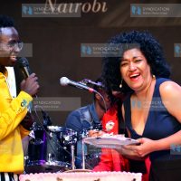 Comedian MCA Tricky shares a light moment Nairobi County Women Rep Esther Passaris