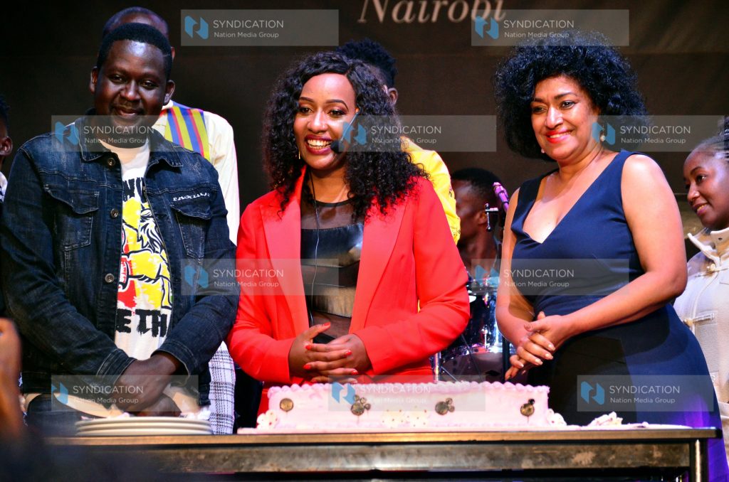 Carolyne Wanjiku also known as Teacher Wanjiku cuts a cake to mark her 10th year anniversary in comedy