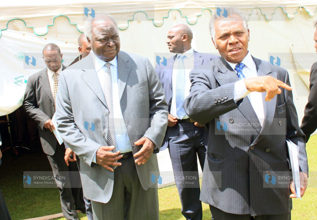 Former President Mwai Kibaki with Nick Wanjohi at the Millenium Water Alliance meeting