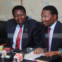 Cabinet secretary for devolution Eugene Wamalwa welcoming his counterpart Mwangi Kiunjuri